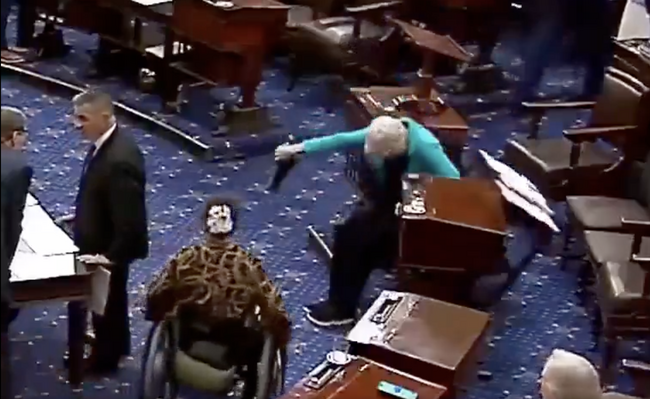“Too Much Fire Water”: Commenters Crack Up as Resurfaced Video Shows Liz Warren Taking a Tumble on the Senate Floor When Trying to Lean on a Desk [WATCH]